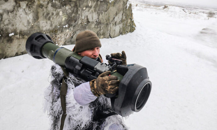 A Ukrainian military serviceman aims with a next generation light anti-tank weapon (NLAW), a Swedish-British anti-tank missile launcher, during a drill at the firing ground of the International Center for Peacekeeping and Security, near the western Ukrainian city of Lviv on Jan. 28, 2022. (AFP via Getty Images)