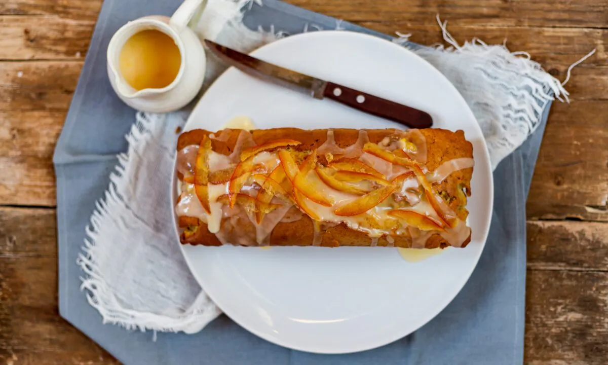 This intensely aromatic cake has triple the citrus power: bits of candied orange peels, freshly grated orange and lemon zest, and an orange juice glaze. (Giulia Scarpaleggia) 