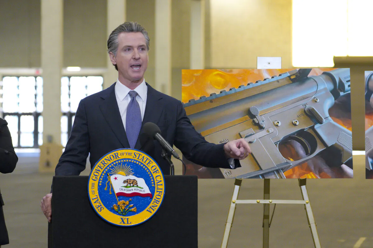 California Gov. Gavin Newsom along with several elected officials, met with the media at Del Mar Fairgrounds in Del Mar, Calif., on Feb. 18, 2022. (Nelvin C. Cepeda/The San Diego Union-Tribune via AP)