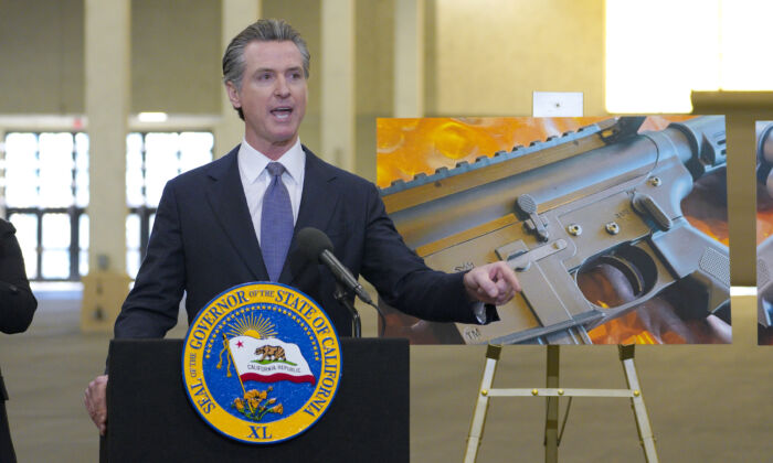 California Gov. Gavin Newsom along with several elected officials, met with the media at Del Mar Fairgrounds in Del Mar, Calif., on Feb. 18, 2022. (Nelvin C. Cepeda/The San Diego Union-Tribune via AP)