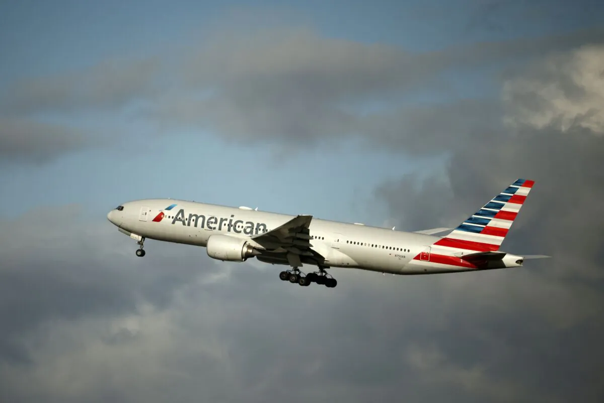 An American Airlines Boeing 777 plane takes off from Paris Charles de Gaulle airport in Roissy-en-France near Paris on Dec. 2, 2021. (Sarah Meyssonnier/Reuters)