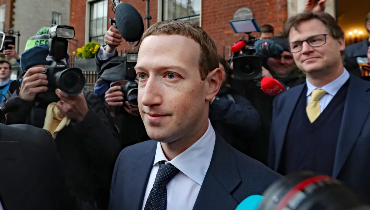 Mark Zuckerberg, center, is understood to have personally recruited Sir Nick Clegg to Facebook in 2018. (Niall Carson/PA)