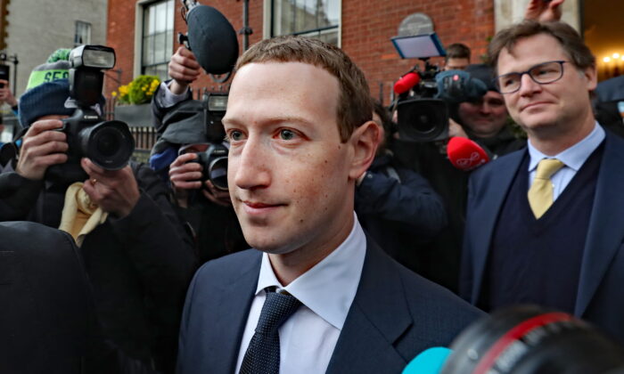 Mark Zuckerberg, center, is understood to have personally recruited Sir Nick Clegg to Facebook in 2018. (Niall Carson/PA)