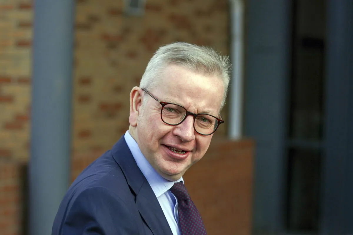 Communities Secretary Michael Gove arrives for a regional cabinet meeting at Rolls Royce in Bristol, England, on Oct. 15, 2021. (Steve Parsons/PA)
