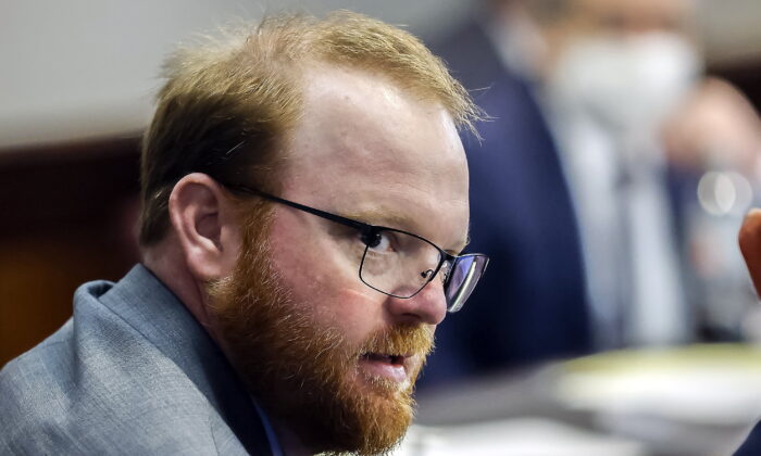 Travis McMichael looks on during the sentencing in his trial along with his father Greg McMichael and neighbor, William "Roddie" Bryan, in the Glynn County Courthouse in Brunswick, Ga., on Jan. 7, 2022. (Stephen B. Morton/Pool Photo via AP)