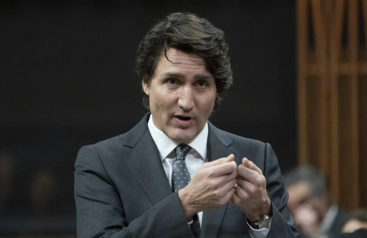 Prime Minister Justin Trudeau rises during question period in the House of Commons in Ottawa on Feb. 15, 2022. (Adrian Wyld/The Canadian Press)