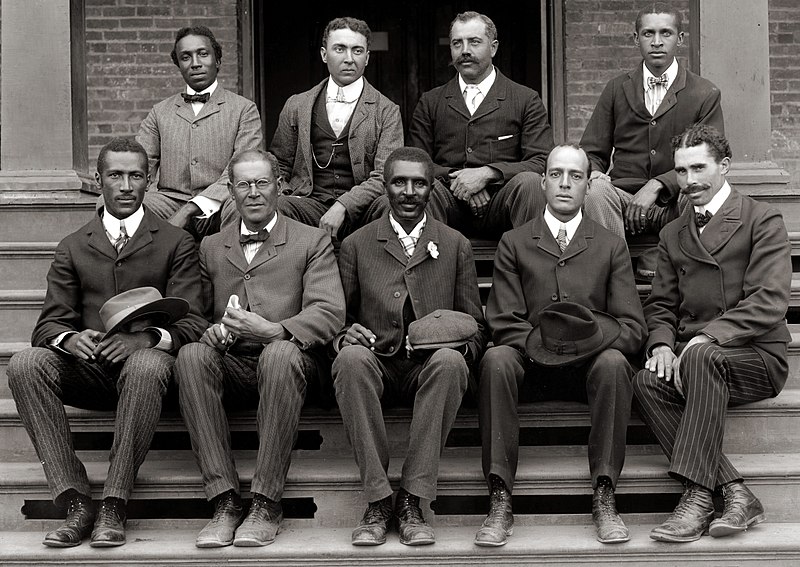 George Washington Carver (front row, center) poses with fellow staff members at the Tuskegee Institute (now known as Tuskegee University) in Alabama, 1902. (Wikipedia)