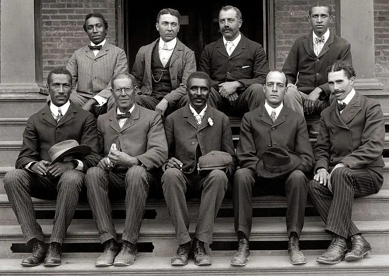 George Washington Carver (front row, center) poses with fellow staff members at the Tuskegee Institute (now known as Tuskegee University) in Alabama, 1902. (Wikipedia)