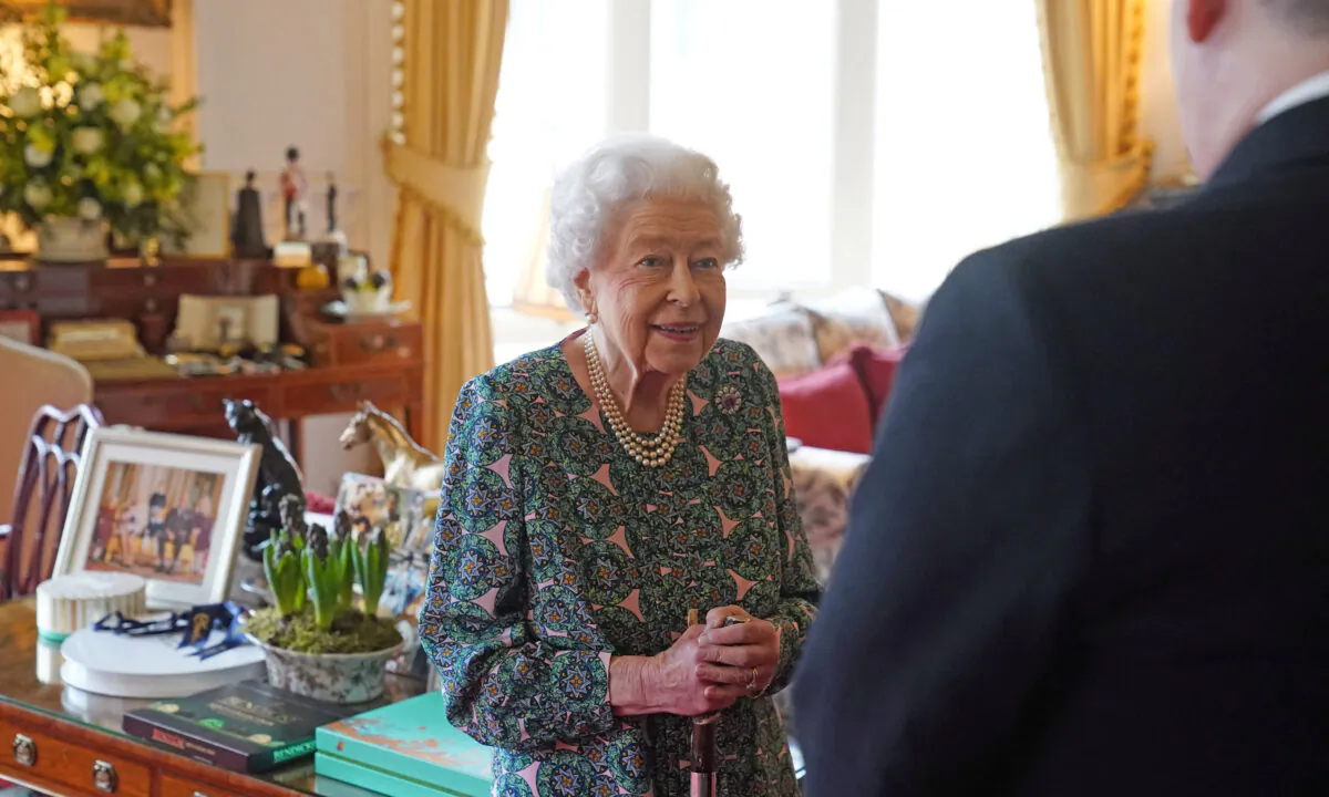 Queen Elizabeth II speaks during an audience where she met the incoming and outgoing Defence Service Secretaries at Windsor Castle in Windsor, Britain, on Feb. 16, 2022. (Steve Parsons/Pool/Reuters)