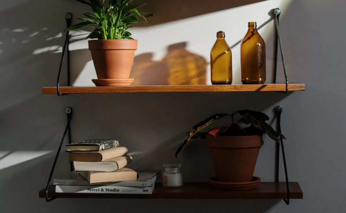 Additional DIY shelving can help organize a messy room. (cottonbro/Pexels)