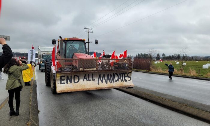 Protesters demonstrate against COVID-19 mandates near the Pacific Highway border crossing in Surrey, B.C., on Feb. 19, 2022. (Jeff Sandes/The Epoch Times)