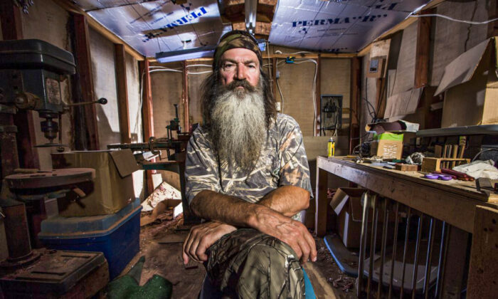 This undated image released by A&E shows Phil Robertson from the popular series "Duck Dynasty." Robertson was suspended for disparaging comments he made to GQ magazine about gay people but was reinstated by the network on Friday, Dec. 27. In a statement Friday, A&E said it decided to bring Robertson back to the reality series after discussions with the Robertson family and "numerous advocacy groups." (AP Photo/A&E,)