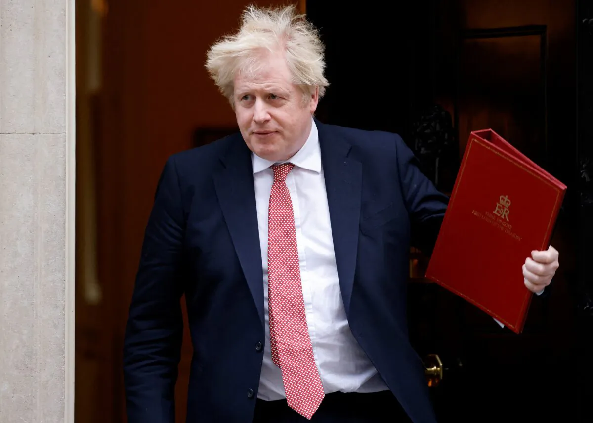 Britain's Prime Minister Boris Johnson leaves from 10 Downing Street in central London on Feb. 21, 2022. (Tolga Akmen /AFP via Getty Images)