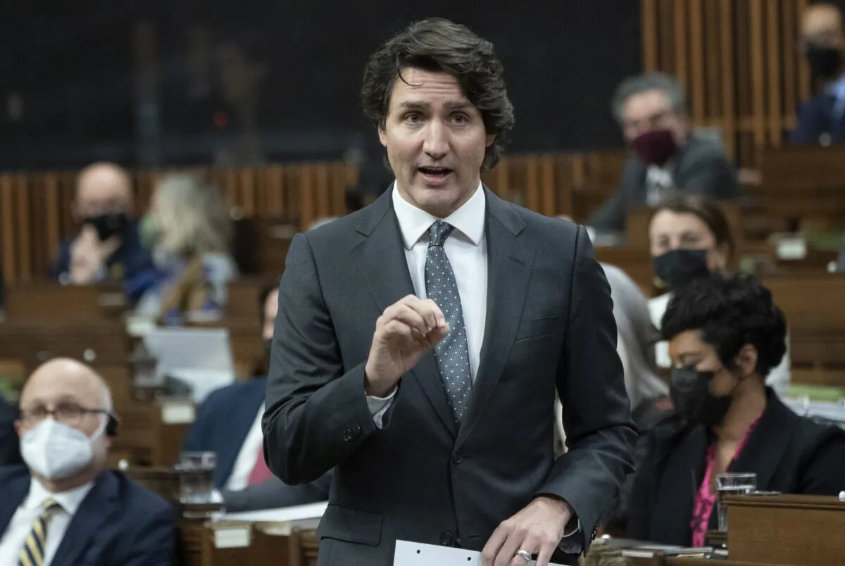 Prime Minister Justin Trudeau rises during question period in the House of Commons in Ottawa on Feb. 15, 2022. (Adrian Wyld/The Canadian Press)