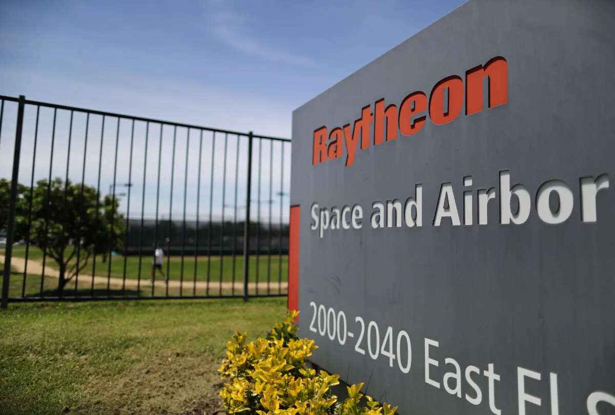 A sign is posted at a Raytheon Co. campus in El Segundo, Calif., on June 10, 2019. (Mario Tama/Getty Images)