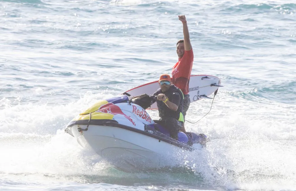 Winner of the Hurley Pro Sunset Beach Hawaii's Barron Mamiya cebebrates on the final day of the event on the North shore of Oahu on February 18, 2022. (Photo by BRIAN BIELMANN/AFP via Getty Images)
