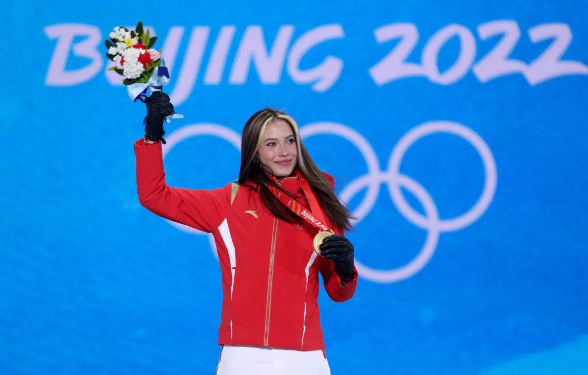 Gold medallist Eileen Gu of Team China poses with her medal during the Women's Freeski Halfpipe medal ceremony on Day 14 of the 2022 Beijing Winter Olympic Games in Zhangjiakou, China, on Feb. 18, 2022. (Ezra Shaw/Getty Images)