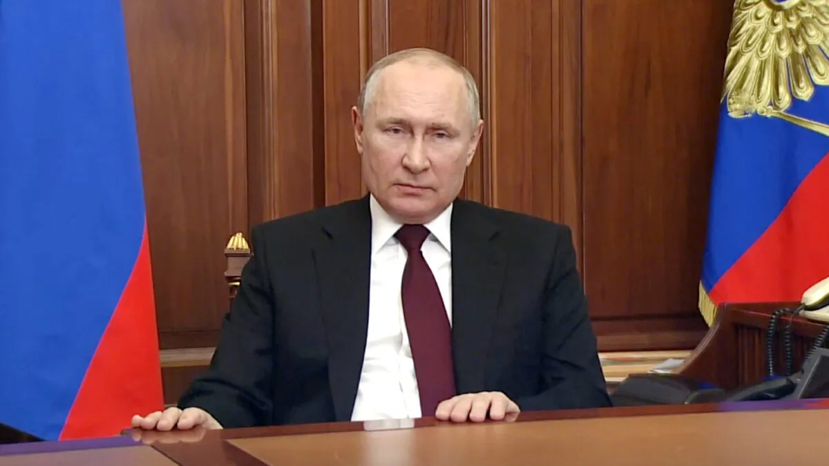 Russian President Vladimir Putin addresses the nation at the Kremlin in Moscow on Feb. 21, 2022, in a still from video. (Russian Pool via Reuters/Screenshot via The Epoch Times)