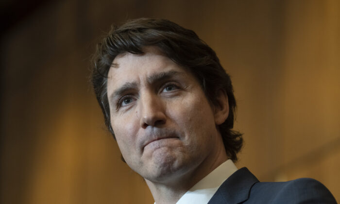 Prime Minister Justin Trudeau listens to a question during a news conference on Feb. 21, 2022, in Ottawa.  THE CANADIAN PRESS/Adrian Wyld