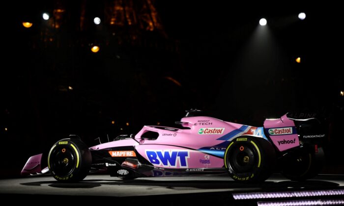 The new Alpine A522 car is seen with the Eiffel Tower during the launch of Formula One in Paris, on Feb. 21, 2022. (Sarah Meyssonnier/Reuters) 