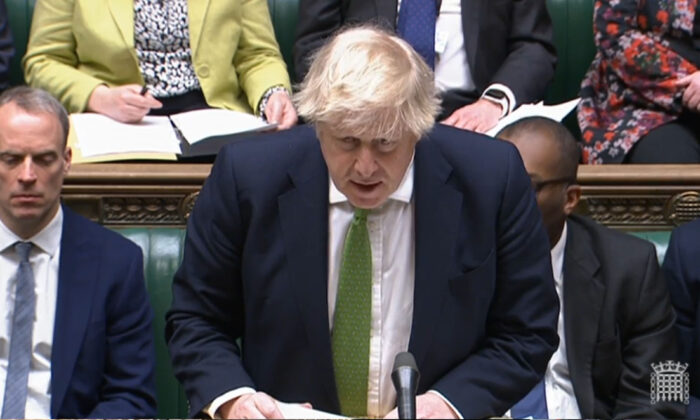 Prime Minister Boris Johnson updates MPs on the latest situation regarding Ukraine, in the House of Commons in London, on Feb. 22, 2022. (PA)