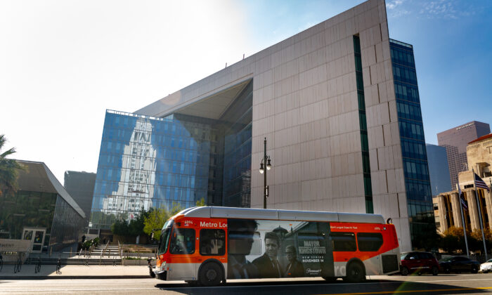 An LA Metro bus transports passengers in downtown Los Angeles on Nov. 8, 2022. (John Fredricks/The Epoch Times)