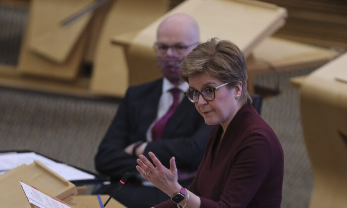 Scottish First Minister Nicola Sturgeon speaks during a COVID-19 update to the Scottish Parliament in Edinburgh, on Feb. 22, 2022. (Fraser Bremner - Pool/Getty Images)