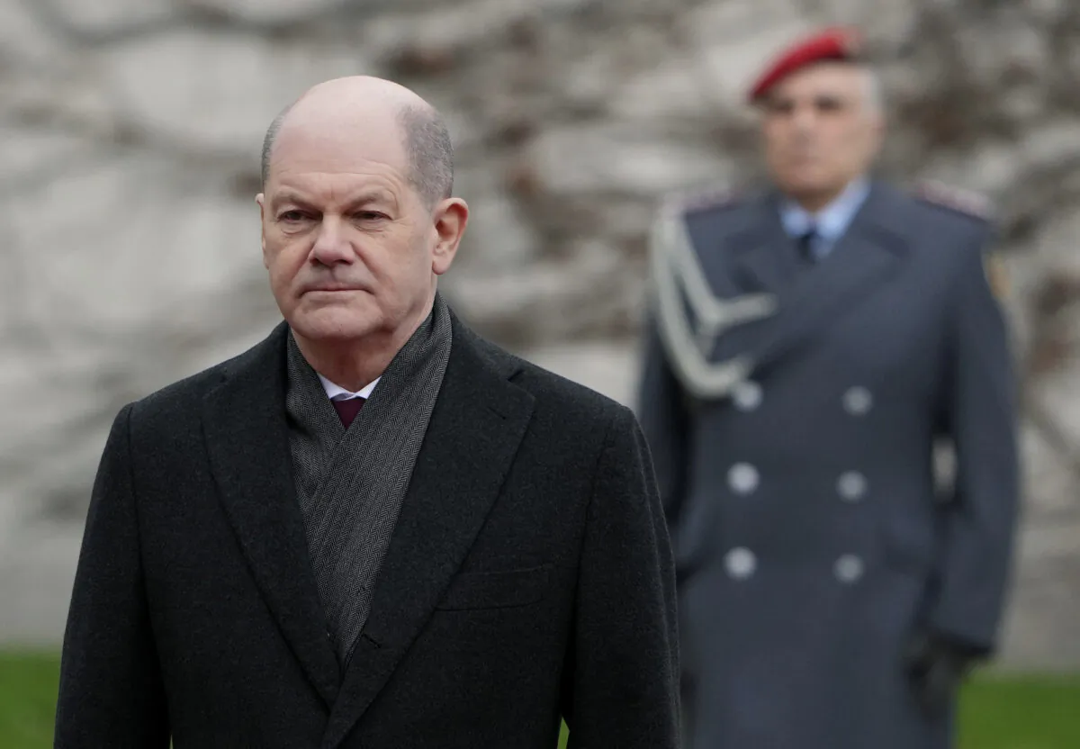 German Chancellor Olaf Scholz waits for Ireland's Prime Minister Micheal Martin at the chancellery in Berlin, Germany, on Feb. 22, 2022. (Michael Sohn/AP Photo)