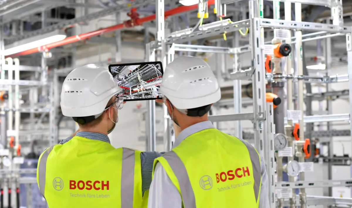 Technicians supervise operations at the new Bosch 300-millimeter wafer fab for silicon chips in Dresden, Germany, on May 31, 2021. (Matthias Rietschel/Reuters)