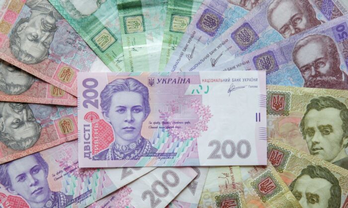 Ukrainian hryvnia banknotes are seen in a photo illustration shot in Kyiv, Ukraine, on Aug. 6, 2014. (Konstantin Chernichkin/Reuters)