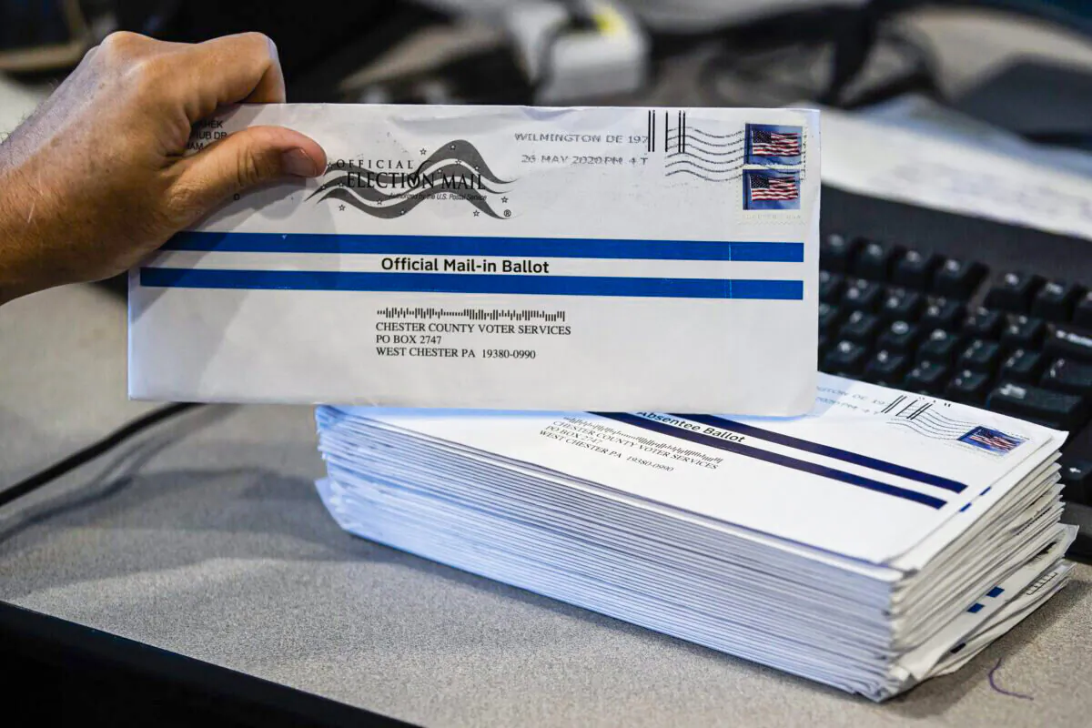 Mail-in primary election ballots are processed at the Chester County Voter Services office in West Chester, Pa., on May 28, 2020. (Matt Rourke/AP Photo)