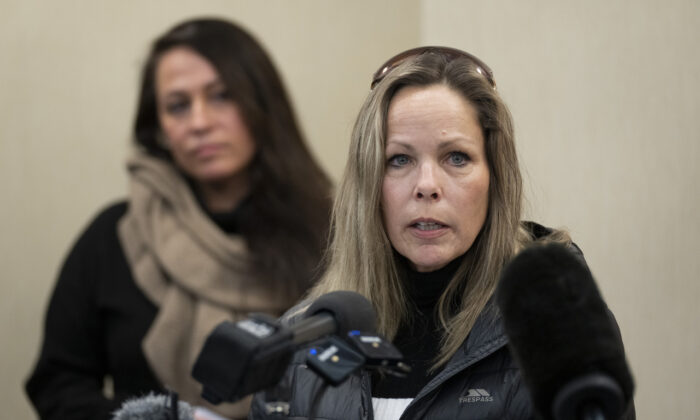 Tamara Lich (R), one of the organizers of the Freedom Convoy, speaks at a news conference in Ottawa on Feb. 3, 2022. (Adrian Wyld/The Canadian Press)