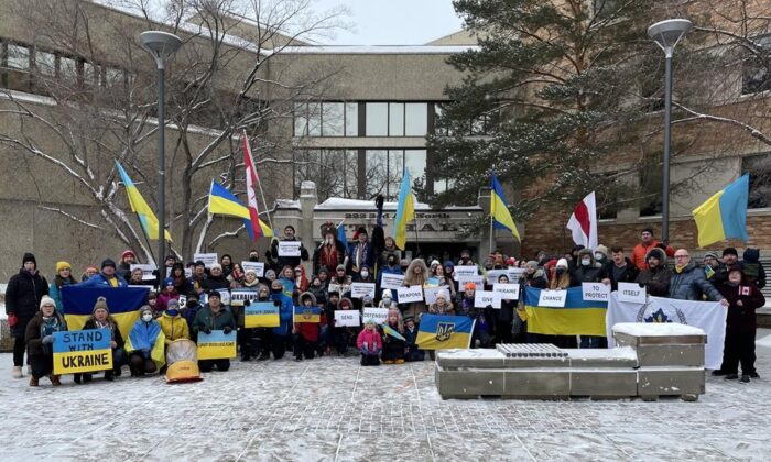 Members of the Saskatoon chapter of the Ukrainian Canadian Congress of Saskatchewan holds a rally outside Saskatoon City Hall in a Feb. 6, 2002 handout photo. (The Canadian Press/HO-Ukrainian Canadian Congress of Saskatchewan)