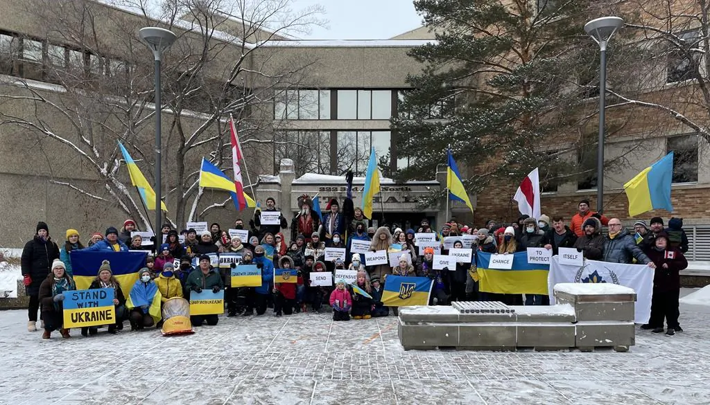 Members of the Saskatoon chapter of the Ukrainian Canadian Congress of Saskatchewan holds a rally outside Saskatoon City Hall in a Feb. 6, 2002 handout photo. (The Canadian Press/HO-Ukrainian Canadian Congress of Saskatchewan)