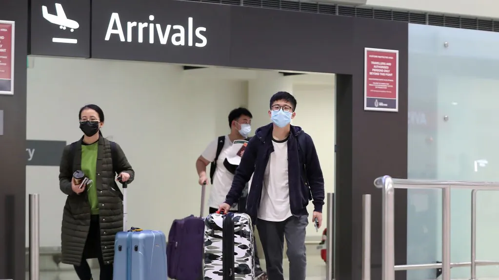Passengers from China arrive at Perth International Airport, Australia on Feb. 2, 2020. (Paul Kane/Getty Images)