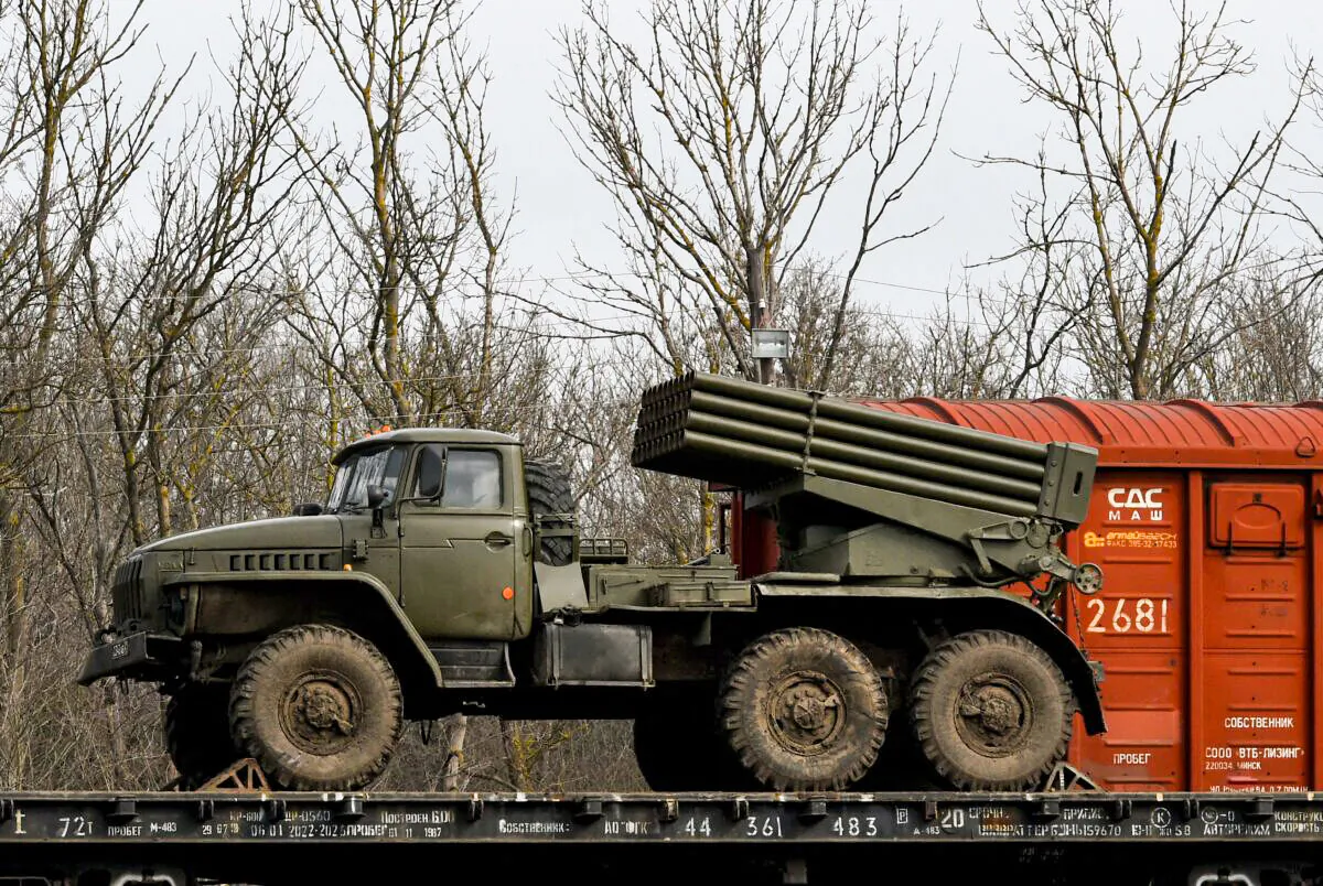 Russian military vehicles are seen loaded on train platforms some 50 kilometers (30 miles) off the border with the self-proclaimed Donetsk People's Republic in Russia's southern Rostov region on Feb. 23, 2022. (Stringer/AFP via Getty Images)