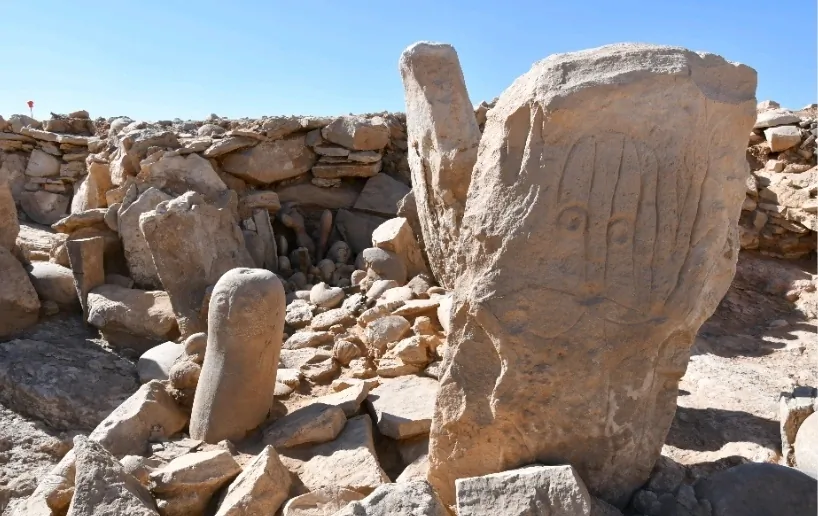 Two carved standing stones at a remote Neolithic site in Jordan’s eastern desert. (Tourism Ministry via AP)