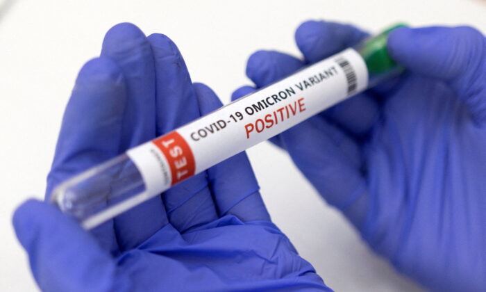 A test tube labelled "COVID-19 Omicron variant test positive" is seen in this illustration photo taken on Jan. 15, 2022. (Dado Ruvic/Illustration/Reuters)