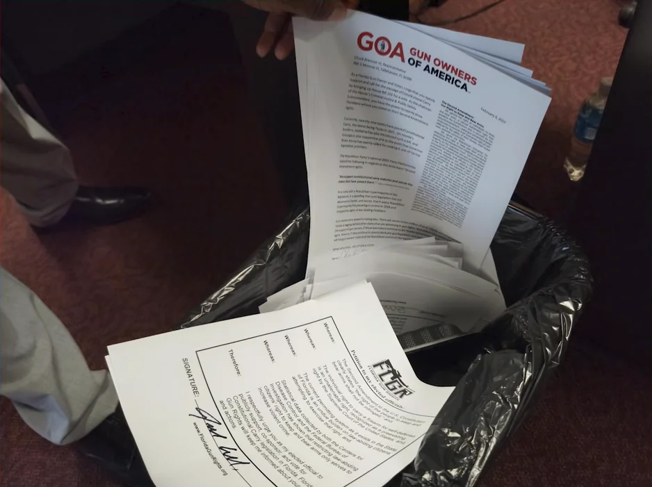 Petitions gathered by members of gun rights organizations were thrown into a trashcan By Florida State Rep. Chuck Brannan's legislative aide soon after being delivered to the office. (Courtesy of Luis Valdes)