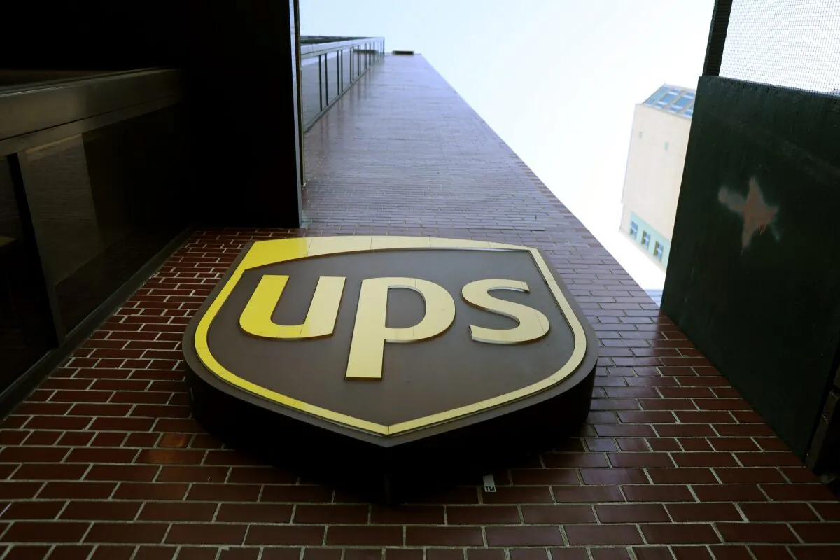 A United Parcel Service (UPS) sign is displayed outside of a UPS facility during a job fair in New York, on Nov. 1, 2019. (Spencer Platt/Getty Images)
