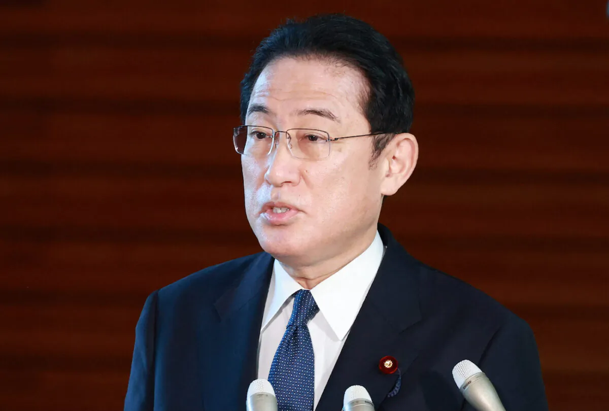 Japan's Prime Minister Fumio Kishida speaks to the media about the crisis between Russia and Ukraine, at the prime minister's office in Tokyo, on Feb. 22, 2022. (STR/JIJI PRESS/AFP via Getty Images)