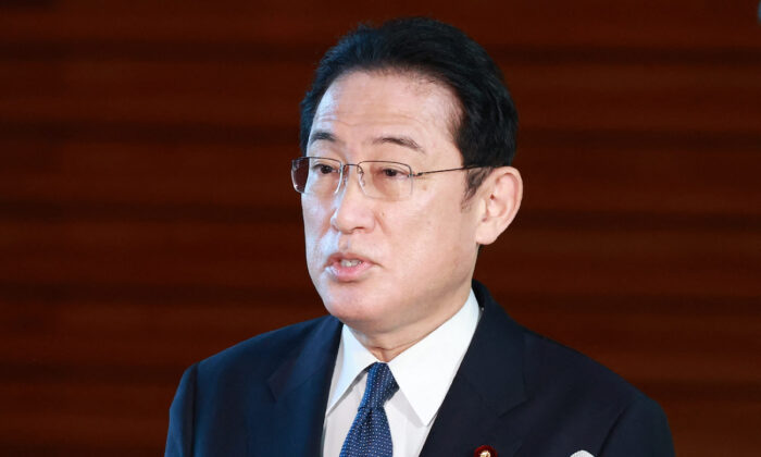 Japan's Prime Minister Fumio Kishida speaks to the media about the crisis between Russia and Ukraine, at the prime minister's office in Tokyo, on Feb. 22, 2022. (STR/JIJI PRESS/AFP via Getty Images)