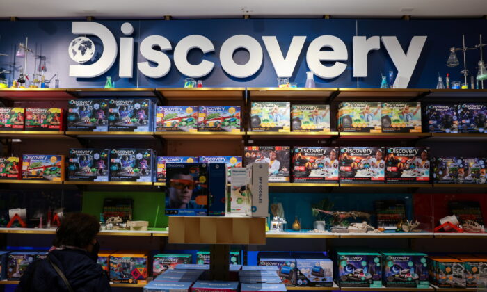 The Discovery Inc. logo is seen on a display in the FAO Schwarz toy store in Manhattan, New York, on Nov. 24, 2021. (Andrew Kelly/Reuters)