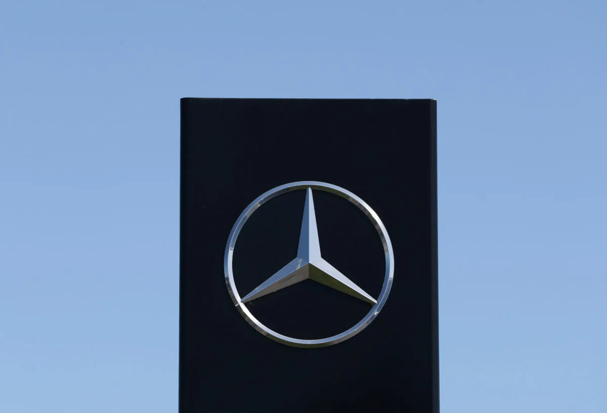 A logo of Mercedes-Benz is seen outside a Mercedes-Benz car dealer, amid the COVID-19 outbreak in Brussels, on May 28, 2020. (Yves Herman/Reuters)
