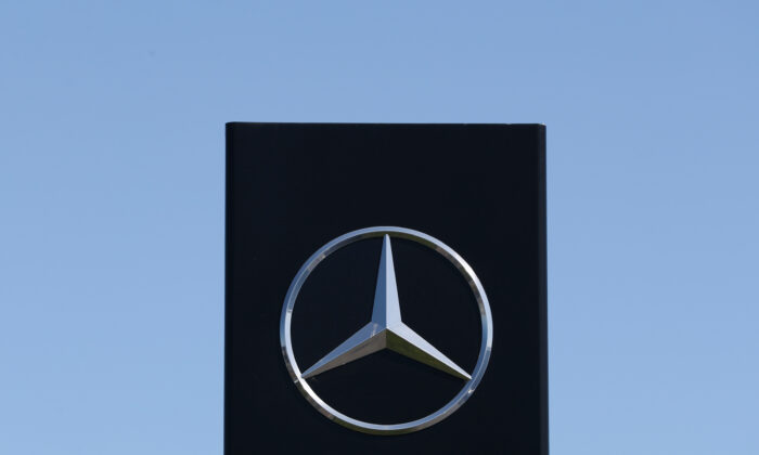 A logo of Mercedes-Benz is seen outside a Mercedes-Benz car dealer, amid the COVID-19 outbreak in Brussels, on May 28, 2020. (Yves Herman/Reuters)