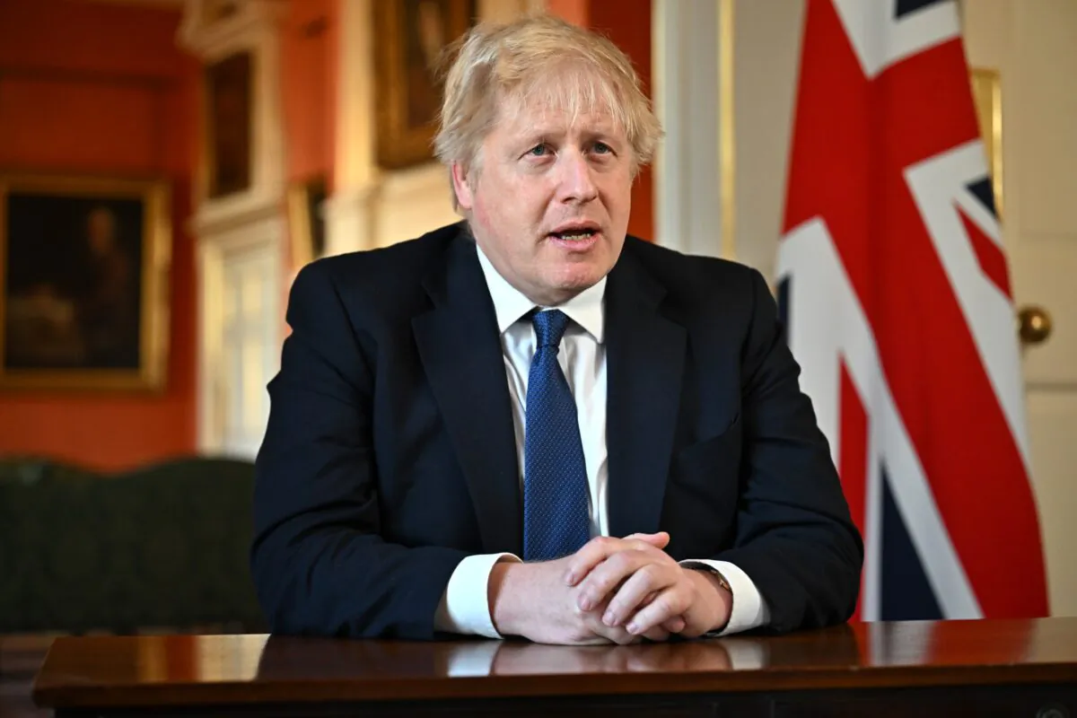 Prime Minister Boris Johnson records an address to the nation after he chaired an emergency COBRA meeting to discuss the UK response to the crisis in Ukraine, in Downing Street, central London, on Feb. 24, 2022. (Jeff J Mitchell - WPA Pool /Getty Images)