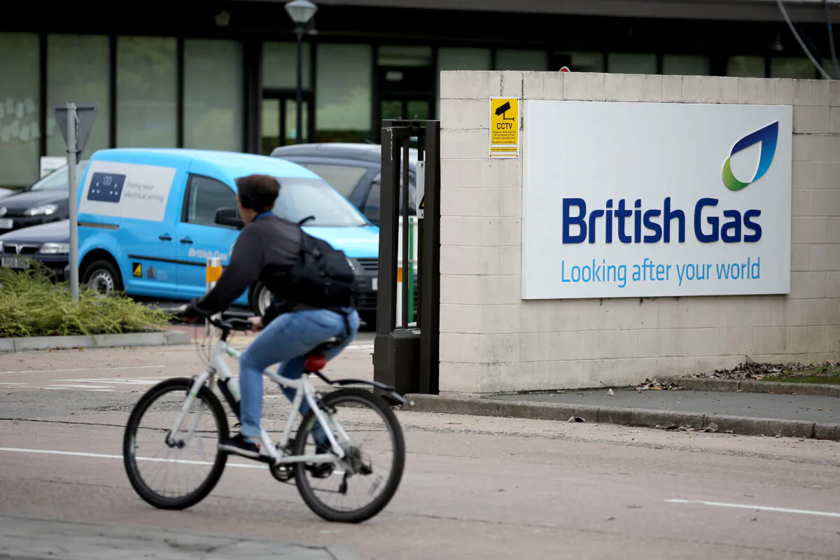 A cyclist passes the British Gas Centre in Leicester, UK on Oct. 17, 2013. (Christopher Furlong/Getty Images)