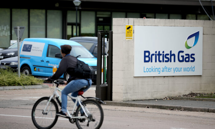 A cyclist passes the British Gas Centre in Leicester, UK, on Oct. 17, 2013. (Christopher Furlong/Getty Images)