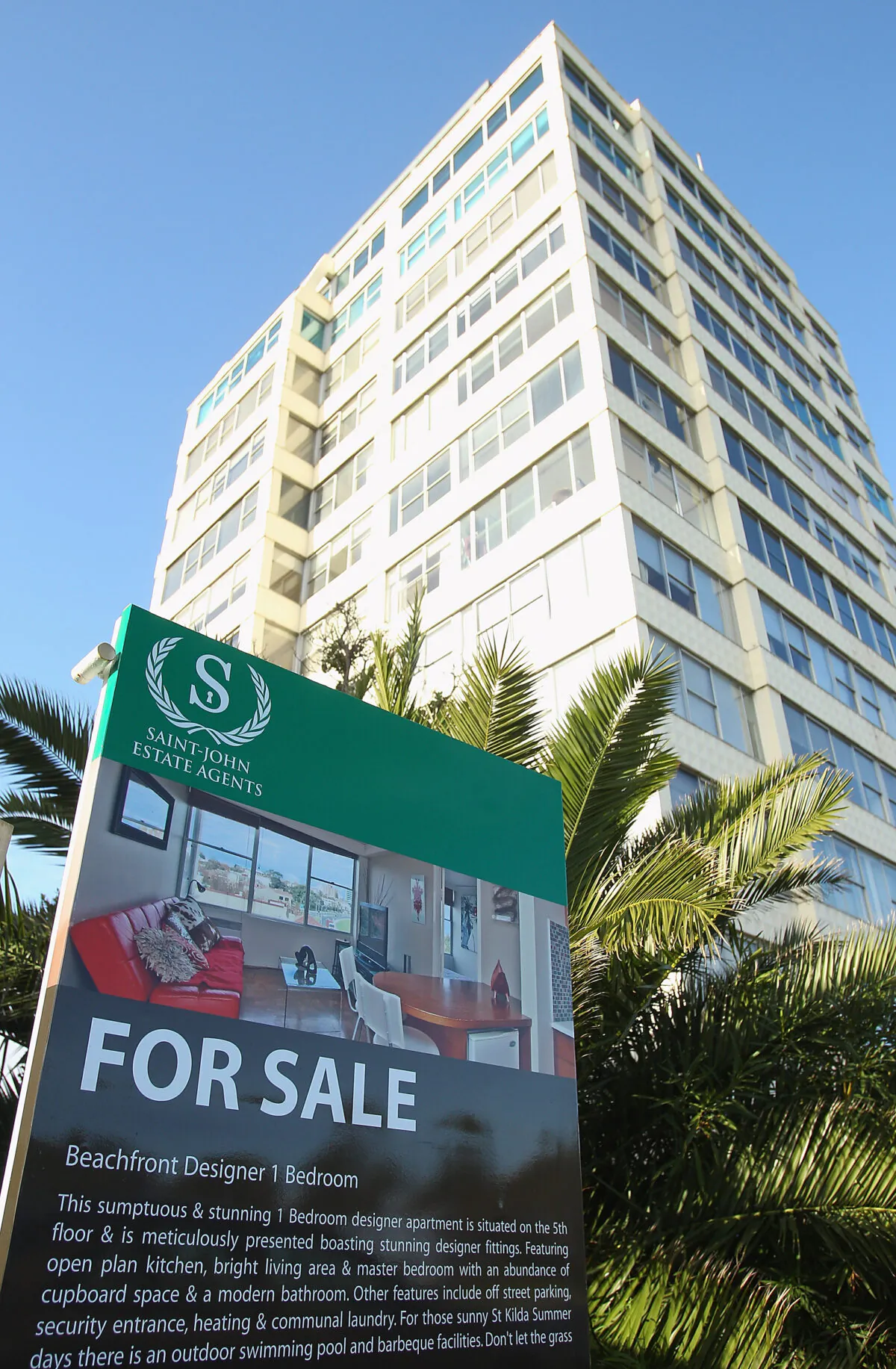 A sale board stands out the front of a property in Middle Park  in Melbourne, Australia, on June 17, 2011. (Quinn Rooney/Getty Images)