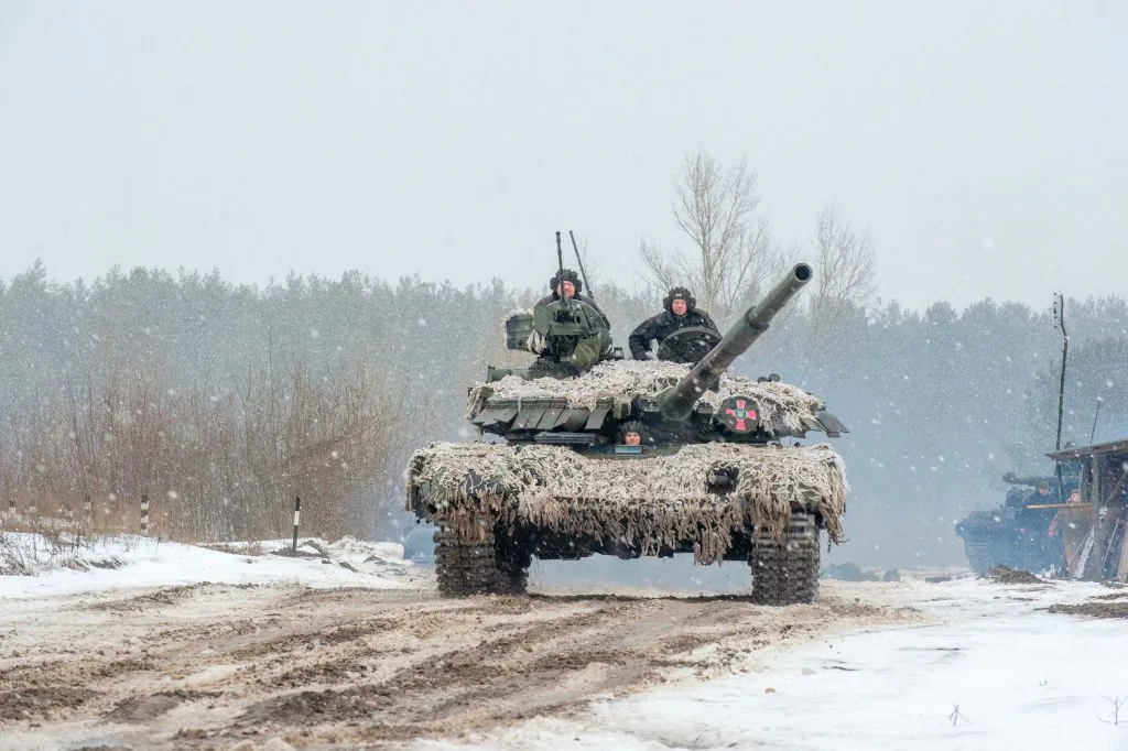 Ukrainian Military Forces servicemen use tanks, self-propelled guns and other armored vehicles to conduct live-fire exercises near the town of Chuguev, in Kharkiv region, on Feb. 10, 2022. (Sergey Bobok/AFP via Getty Images)